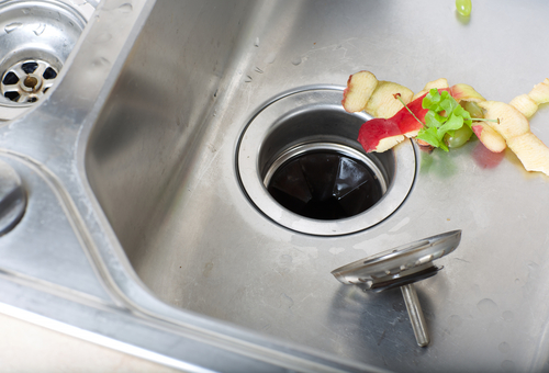 A backed-up garbage disposal contributes to water pipe problems.